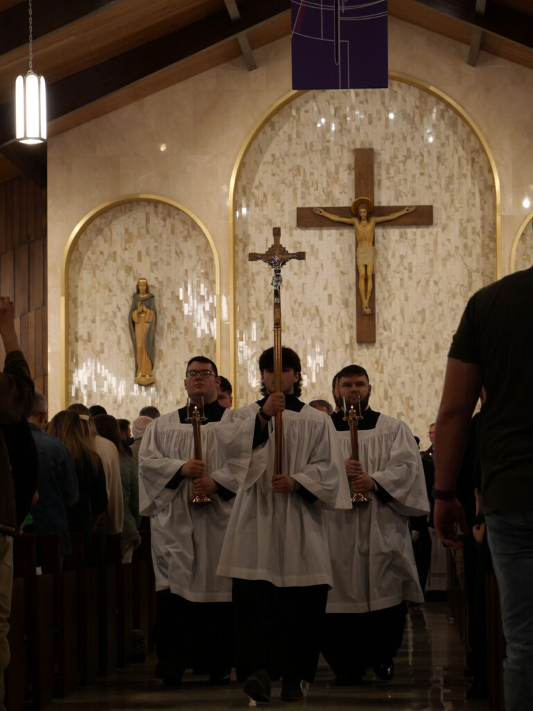Altar servers in procession at Mass of Blessing for the re-opening of St. Patrick Parish in Hubbard, Ohio on March 17, 2024. Photo by Michael Houy.