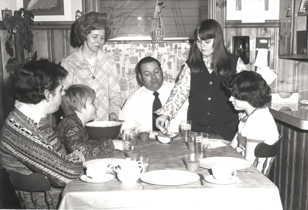 The Welsh Family gathers around the table in 1977. Exponent File Photo