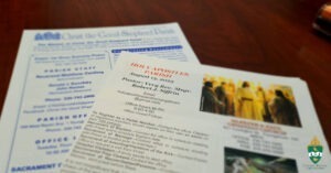 Parish bulletins on a table