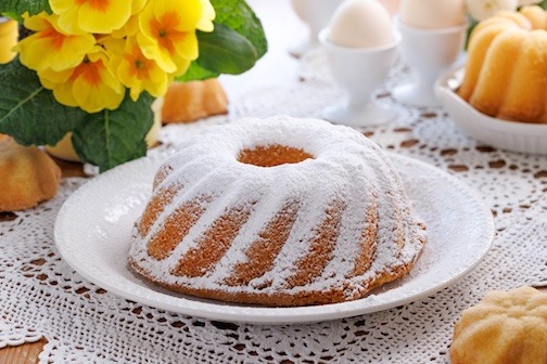 Image of Jewish Apple Cake, surrounded by yellow flowers