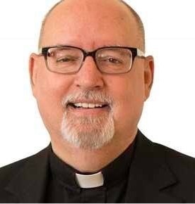 Headshot of Father Roehrig