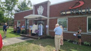 Bishop Bonnar blesses the bookstore in canfield