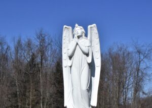 image of an angel statue in a cemetery