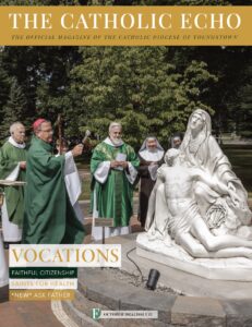 Cover of the October 2024 issue, featuring bishop bonnar blessing a statue at the Poor Clare campus in canton