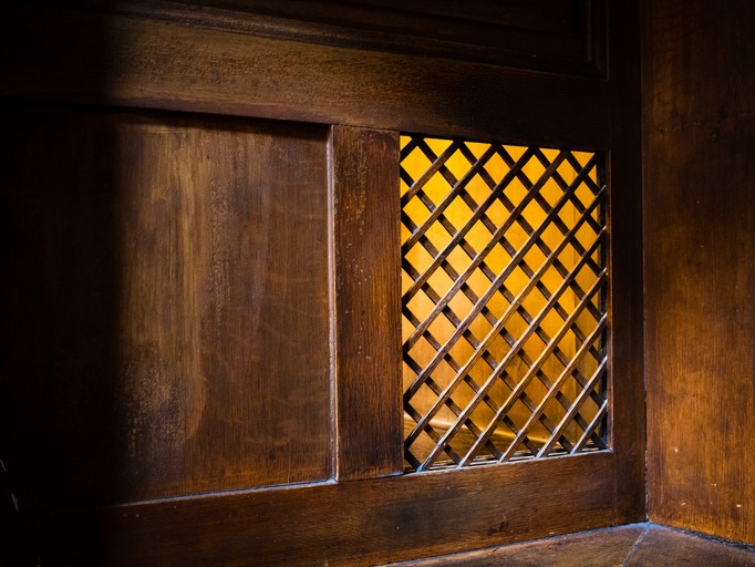 stock image of a confessional booth