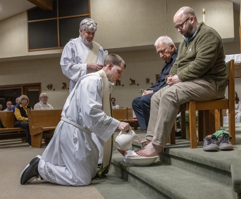 Father washes feet at Holy Spirit Parish in Uniontown