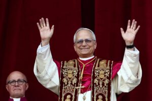 Cardinal Robert Francis Prevost, who has chosen the papal name Leo XIV, appears on the central balcony of St. Peter's Basilica at the Vatican May 8, 2025, following his election during the conclave. He is the first American pope in history. (OSV News photo/Yara Nardi, Reuters)