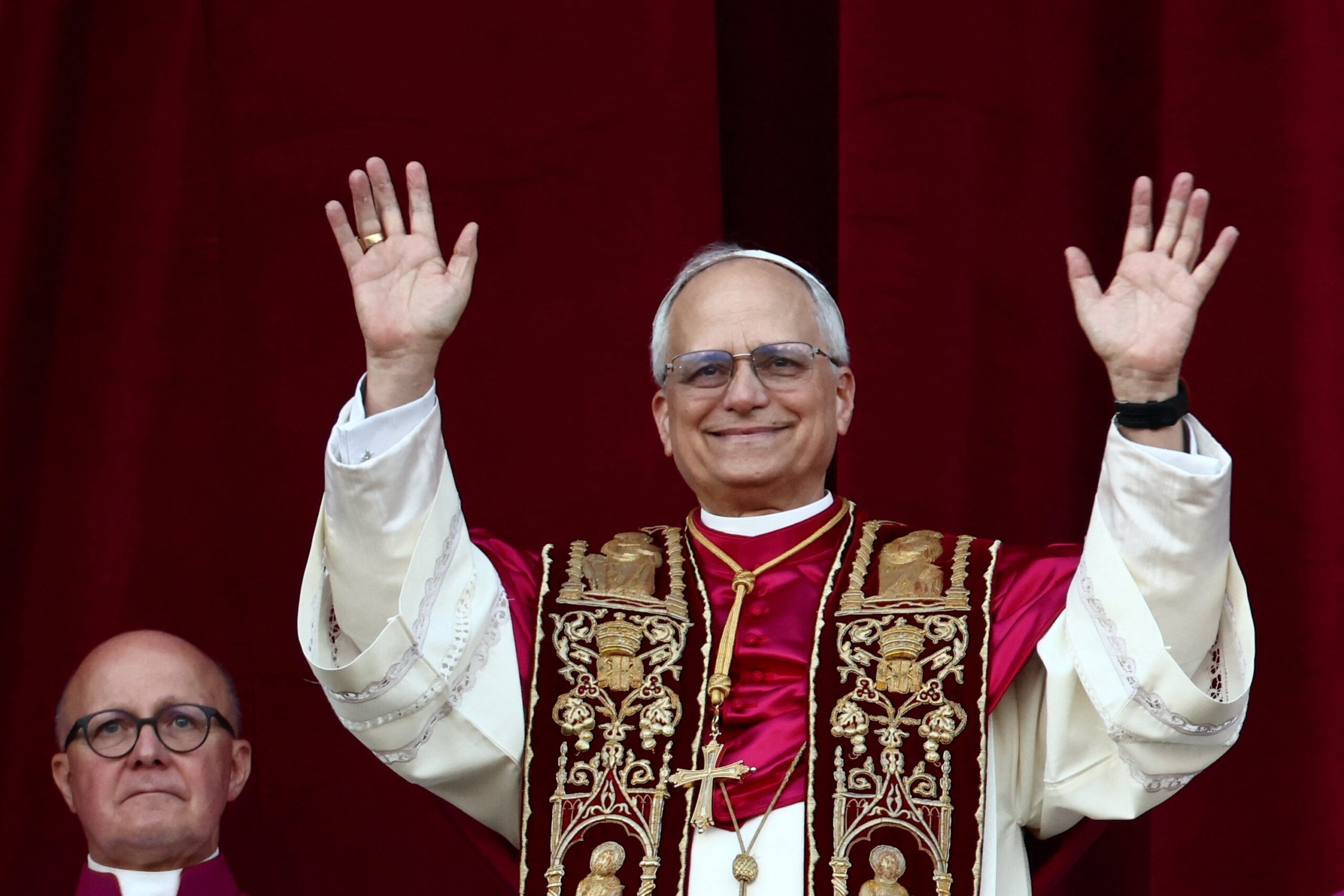 Cardinal Robert Francis Prevost, who has chosen the papal name Leo XIV, appears on the central balcony of St. Peter's Basilica at the Vatican May 8, 2025, following his election during the conclave. He is the first American pope in history. (OSV News photo/Yara Nardi, Reuters)