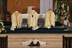 Photo from Bishop Bonnar's ordination, of him laying prostrate on the altar
