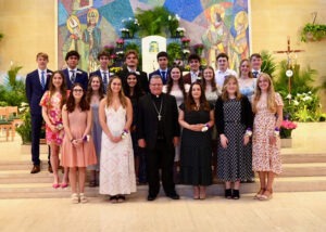 This photo includes the bishop with all of the recipients of the Eagle of the Cross Award.