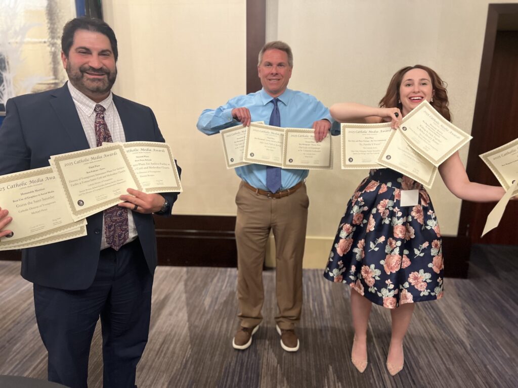 Dennis, Bob and Katie hold their CMC awards