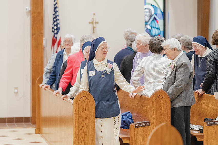 Photo of religious during Mass. Photo by Brian Keith.