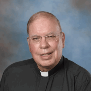 Headshot of Monsignor Rhodes
