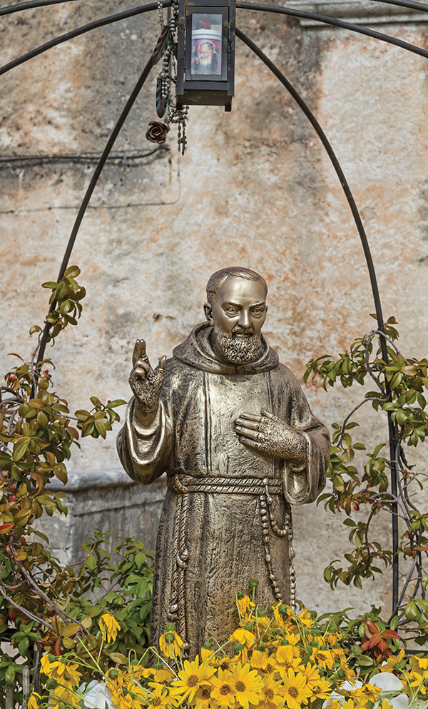 Padre Pio monument on the village square of Vico Gargano
