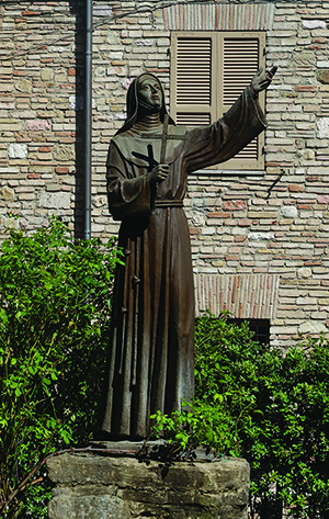 Statue of Santa Chiara in the Rose Garden of the Basilica of Saint Francis.