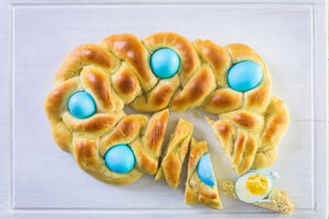 Home made Easter bread with blue eggs.
