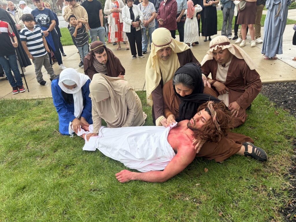 Jesus is taken down from the cross. Living Stations of the Cross at St. Dominic. Photo by Paulina Montaldo.